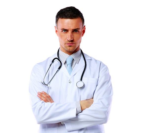 Confident male doctor standing with closed eyes over white backg