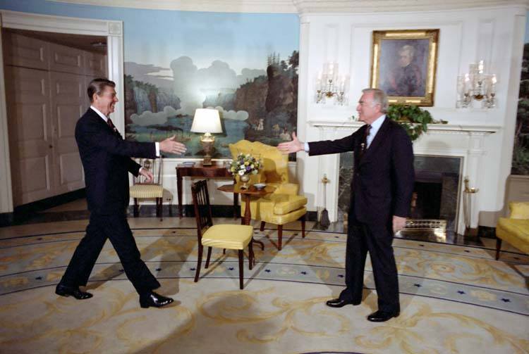 3/3/1981 President Reagan greeting Walter Cronkite for an interview in the Diplomatic Reception room
