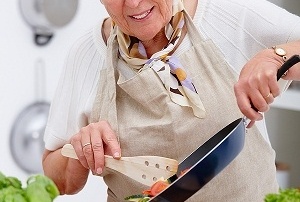 Seniors cooking with coconut oil photo