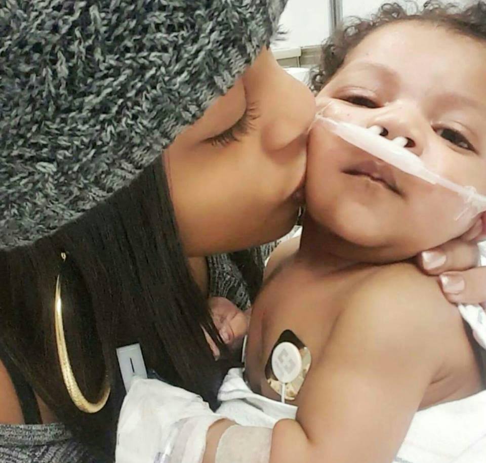 Hayden-mommy-kissing-baby-in-hospital