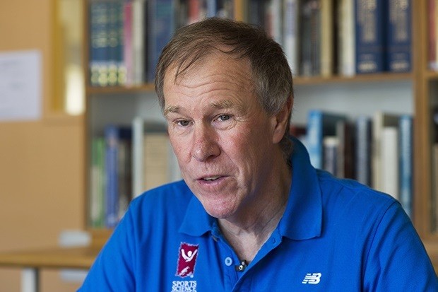 TO GO WITH STORY BY SUSAN NJANJI Tim Noakes speaks during an interview about the Noakes eating plan or Banting diet, at his offices in Cape Town, on September 3, 2015. AFP PHOTO / RODGER BOSCH / AFP PHOTO / RODGER BOSCH