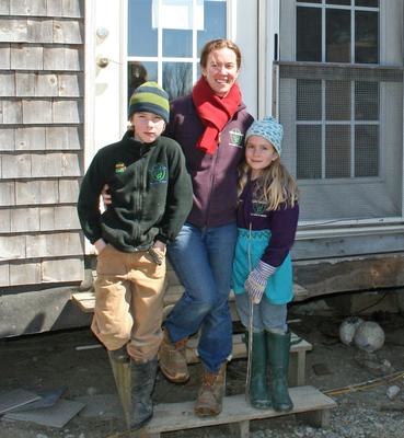 Heather Retberg at her Penobscot farmhouse on Quill’s End Farm with daughter Carolyn and son Ben.