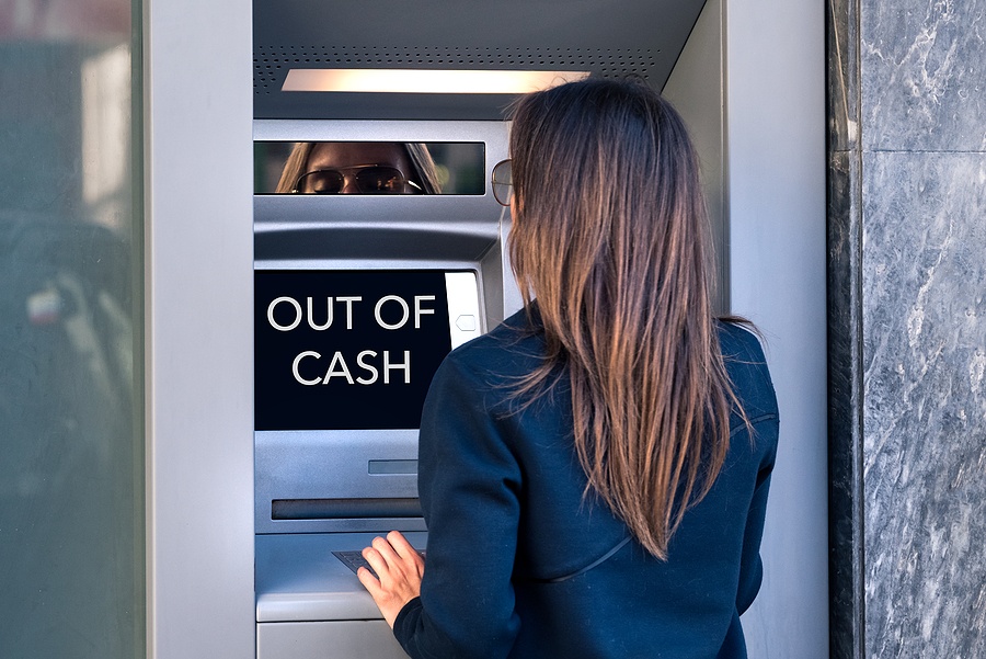 Woman Tries To Take Cash Money From An Atm Machine. Atm Is Out O