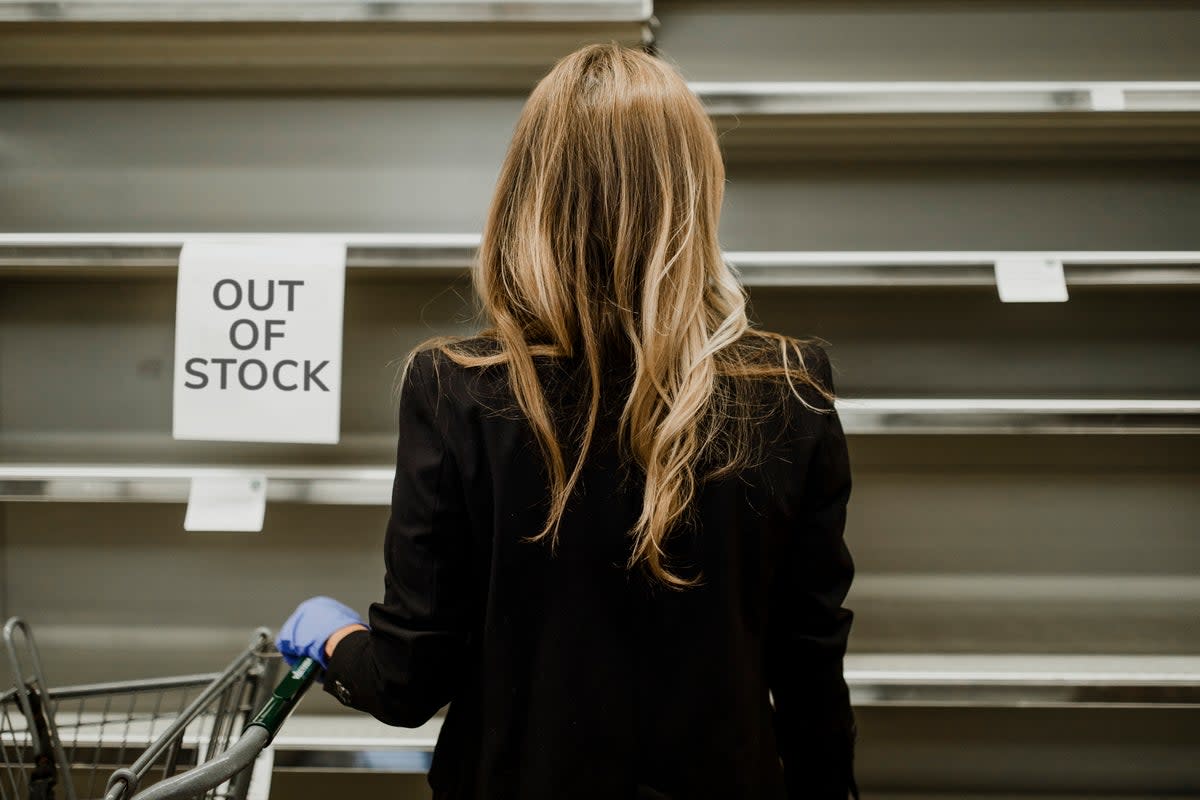 Out of Stock empty shelves american woman shopper